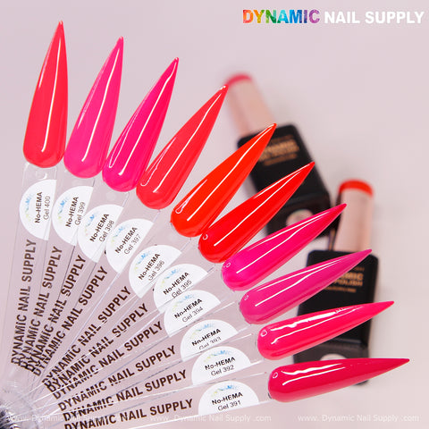 Ten bright pink and red nail tips fan out over Dynamic No-HEMA Gel Polish, Pretty Red Collection, shades 391–400.