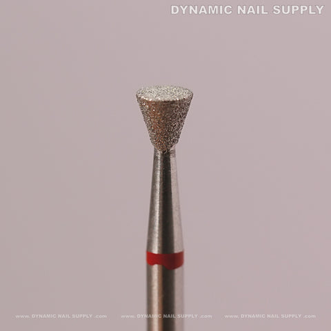 A close-up of the Inverted Corn Diamond Fine Cuticle Bit for dead skin and nail prep against a light pink background.