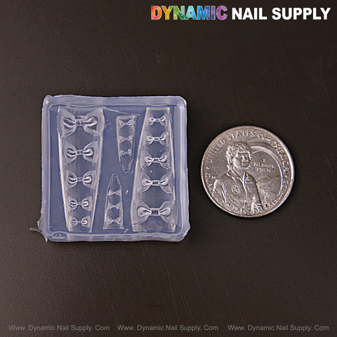 MIxed Size Classic Bows 3D Nail Art Silicone Mold for custom embossed charms; Dynamic Nail Supply above quarter.