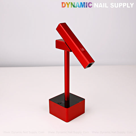 2 in 1 Mini UV/LED Flash Cure Handheld Light with stand, shown on a white surface.