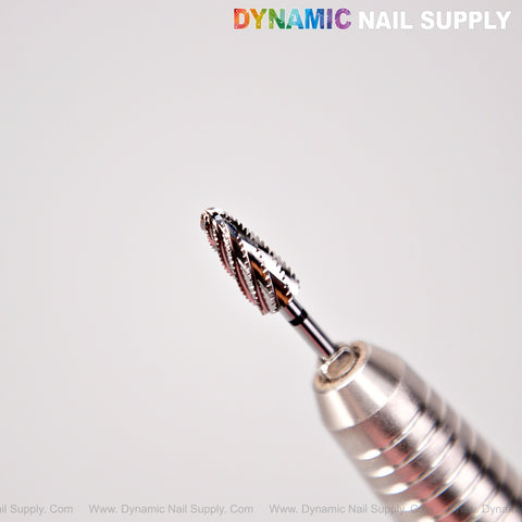 Close-up of Extra Coarse XC Premium Cross Cut Typhoon Bit; DYNAMIC NAIL SUPPLY text at top right.