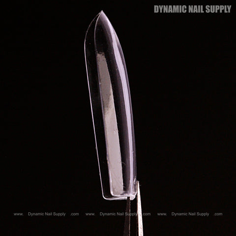A Sculpted Square (Long) Full Cover Soft-Gel Nail Tip (Pink Box) held by tweezers; Dynamic Nail Supply text in corner.