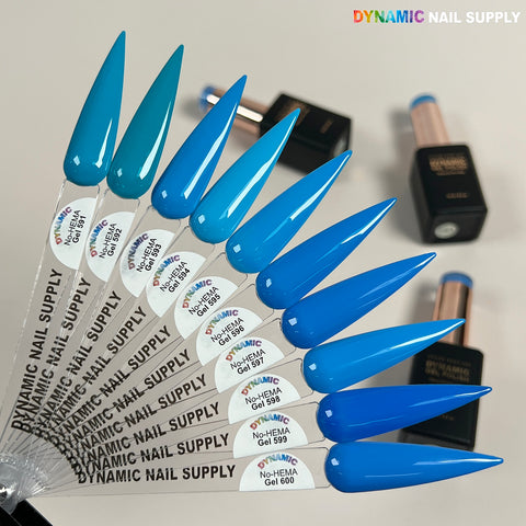 A fan of long, pointed blue nails using Dynamic No-HEMA Gel Polish (591–600) for improved nail health.