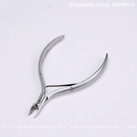 D09 - Jaw 16 stainless steel cuticle nipper with curved handles; Dynamic Nail Supply logo in corner.