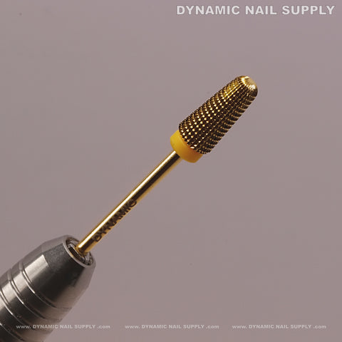 Extra Fine (XF) 5-in-1 Volcano Bit: safely smooths acrylic or gel, gold textured barrel on silver handle.