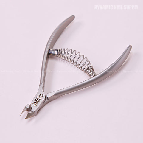 CL.S01 5MM cuticle nipper with spiral springs, stainless steel—perfect for precise nail care on a pink surface.