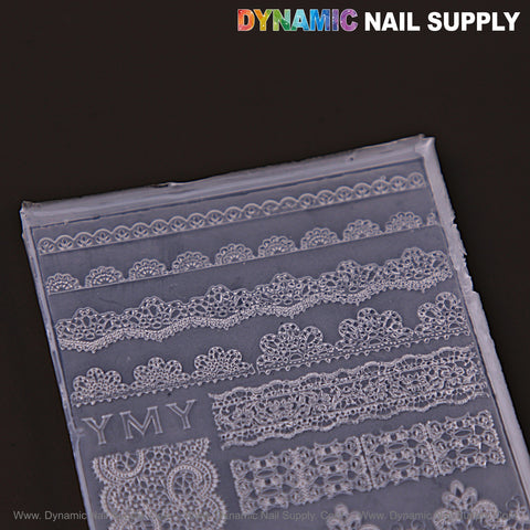 Clear nail art sticker sheet with white lace borders—great for pairing with Mixed Floral Lace Patterns 3D Silicone Charm Molds.