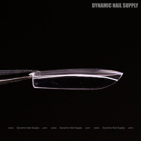 A Natural Square (Short) Full Cover Soft-Gel Nail Tip held by tweezers on black, with Dynamic Nail Supply text visible.