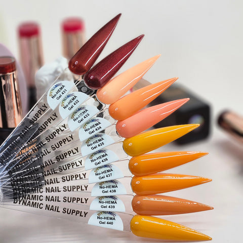Ten gradient swatches, deep red to yellow, shown on labeled sticks of Dynamic No-HEMA Gel Polish 431–440 Fall Vibes.