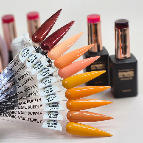Nine long orange-brown swatches with labels, next to three Dynamic No-HEMA Gel Polish bottles, Fall Vibes 431–440.