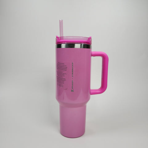 The (Light Pink) Stainless Steel Tumbler (40oz) with handle, lid, and straw stands against a plain white background.