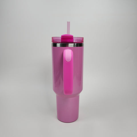 A Light Pink Stainless Steel Tumbler (40oz) with handle, lid, and straw stands against a plain white background.