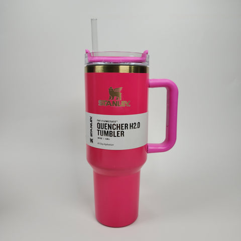 A 40oz Hot Pink Stainless Steel Tumbler with handle, clear lid, and straw is shown on a white background.