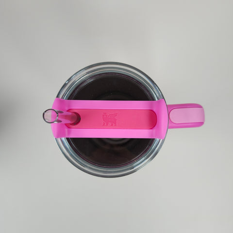 Top view of a (Hot Pink) Stainless Steel Tumbler (40oz) with lid and straw on a light gray background.