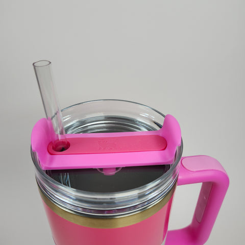 The (Hot Pink) Stainless Steel Tumbler (40oz) has double-wall insulation, a clear lid, and a glass straw.