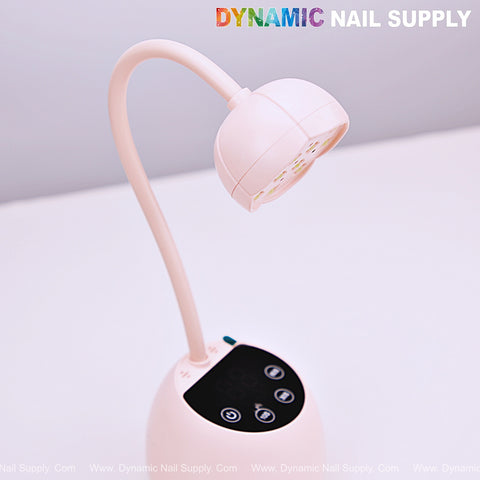 [Light Pink] Mini Flash Cure UV LED Lamp 36W with gooseneck, auto sensor, and USB—fast gel curing by Dynamic Nail Supply.
