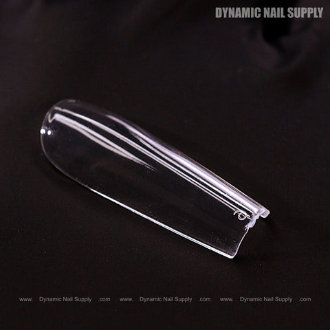 A Natural Square (Long) Full Cover Soft-Gel Nail Tip (Pink Box) lies on black with Dynamic Nail Supply text in the corner.