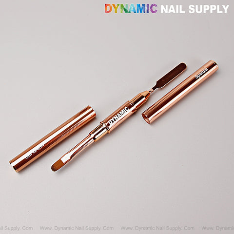 Rose Gold Builder Poly Hard Gel Dual Head Nail Art Brush—oval brush & spatula, caps off, on gray background.