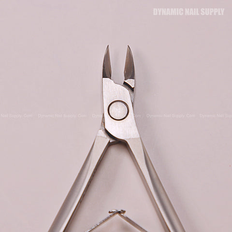 CL.206 7MM Professional Cuticle Nippers, double springs, stainless steel with sharp blades on a light pink background, top view.