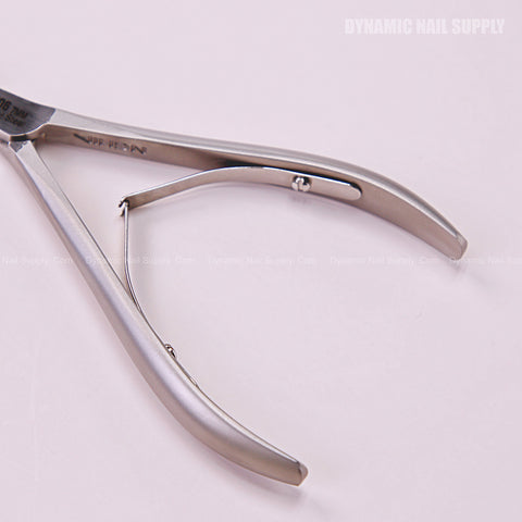 The CL.206 7MM Cuticle Nippers, stainless steel with double springs, are shown on a light pink background for nail care.