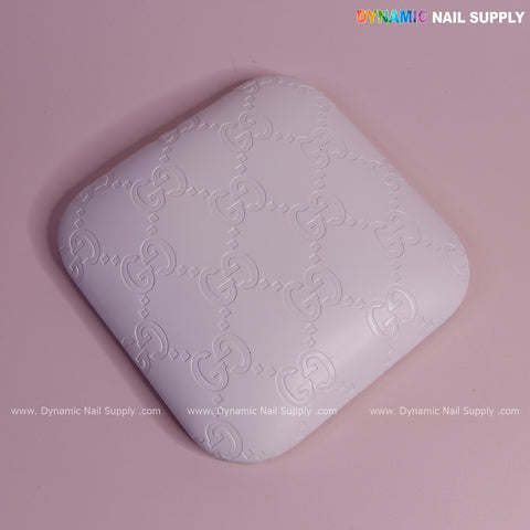 White GC Engrave - Smooth Elbow Pad Pillow: white PU leather, supportive, G pattern on pink, logo top right.