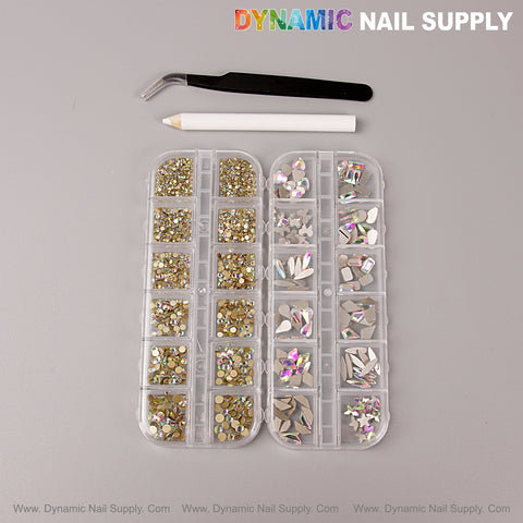 Two [AB] Multi Shape Nail Crystal Gem Sets with kit by Dynamic Nail Supply sit on a gray surface.