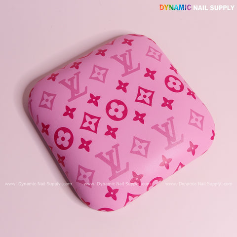 Pink and pink LV smooth leather arm rest cushion pad for manicure nail desk—stylish, comfy elbow support for nail techs.