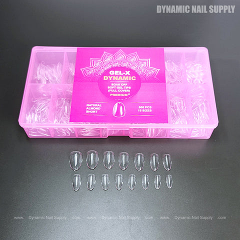 A pink box of Natural Almond (Short) Full Cover Soft-Gel Nail Tips with sample tips displayed in two neat rows.