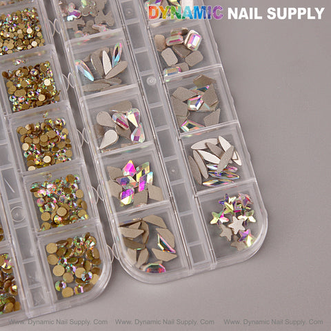 [AB] Multi Shape Size Nail Crystal Gem Rhinestone Set with kit displayed on a gray tray with iridescent gems.