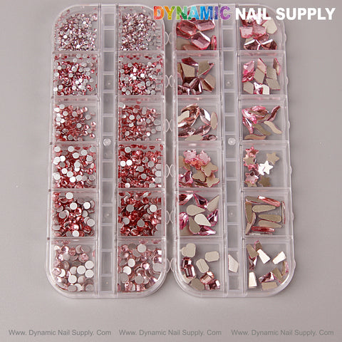 Two organizers hold the Pink Multi Shape Size Nail Crystal Gem Rhinestone Set—flat back, mixed round & shaped crystals.