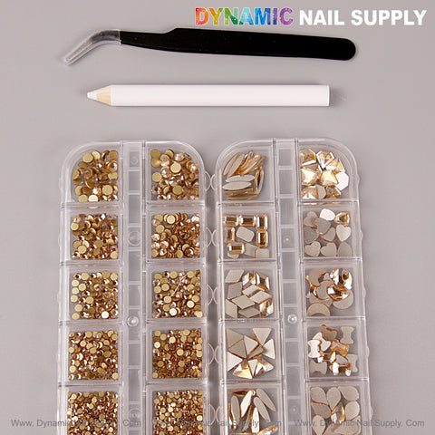 [Champagne Gold] Multi Shape Nail Crystal Gem Set with white pencil & black tweezers, on a gray surface.