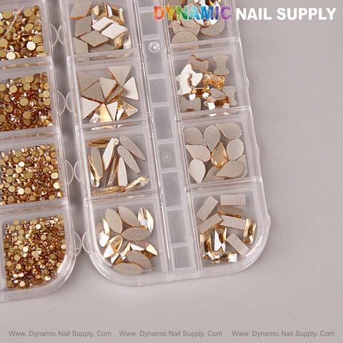 A clear organizer holds Champagne Gold Multi Shape Size Nail Crystal Gem Rhinestone Set—flat back, mixed shapes.