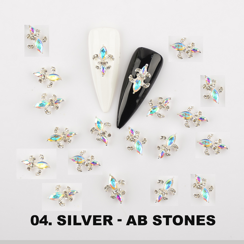 20pcs Saint Fleur De Lis nail charms—Louisiana saint symbol, 12 color options from Dynamic Nail Supply.