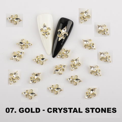 20pcs Saint Fleur De Lis charms (12 color options) from Dynamic Nail Supply styled on black and white sample nails.