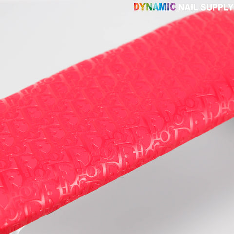 Close-up of the [R-M001] Red Di0r Pattern handrest, perfect as a manicure/pedicure salon accessory.