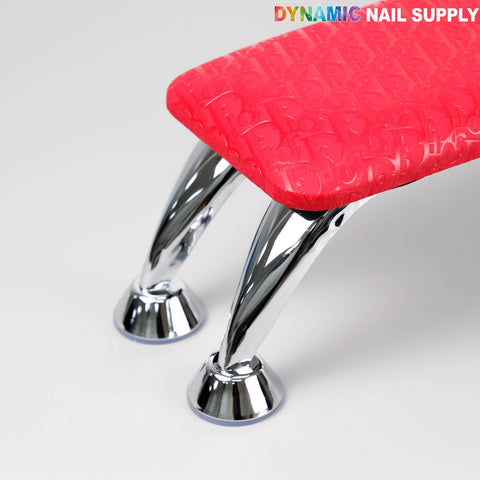 The [R-M001] Red Di0r Pattern Handrest Armrest is a chic manicure accessory for salons by Dynamic Nail Supply.