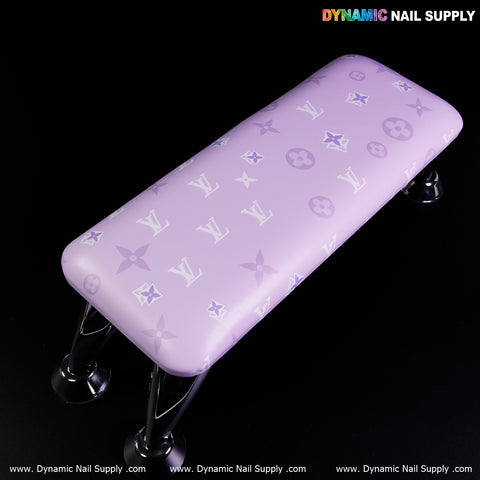 Light purple R-004 armrest with white Louis Vuitton pattern for nail tables, on a black background.