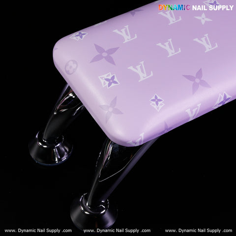 The R-004 Design Armrest features white LV monogram, lavender microfiber leather, and silver metal legs on black.