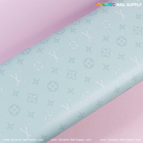 Light blue R-011 PU Leather Armrest with Pillow for pedicure and manicure, shown on a soft pink background.