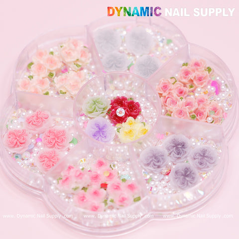 A set of 40 pieces of white and pink 3D rose flower charms, accented with pearls, perfect for a Valentine nails art design. The vibrant colors are brought to you by Dynamic Nail Supply, displayed on a soft pink background.