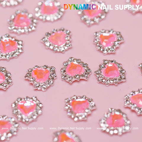 30 pcs 3D Pink Ruby Heart Rhinestone Charms (pink stones, silver base) for nail art by Dynamic Nail Supply.