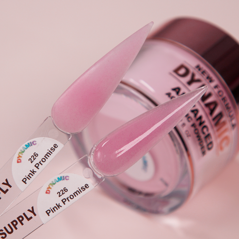 Two nail swatches labeled Pink Promise are above a jar of Pink Promise - Cover Acrylic Powder (#226), a sheer pink shade.
