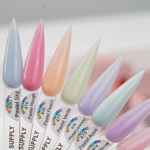 Seven long, pointed tips show off the New 2026 Pastel Spring Colors Acrylic Collection: blue, pink, peach, green, lavender, aqua, mauve.