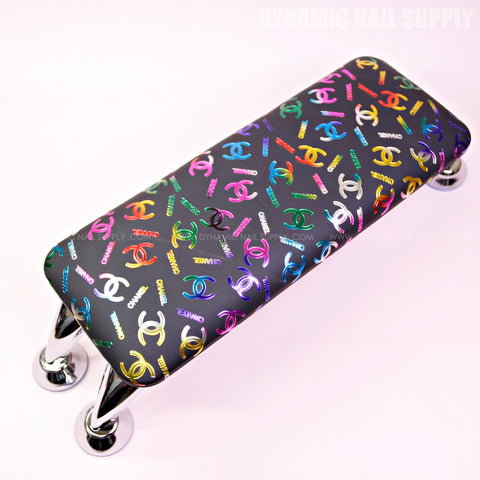 RM008 Multi-colors CC Pattern manicure armrest with chrome legs—a stylish designer accessory for hand and foot nail care.