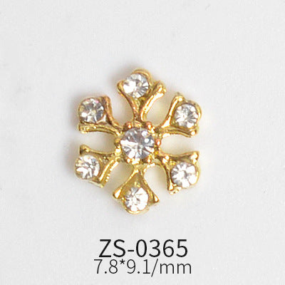 A gold, snowflake-shaped charm featuring six arms, each decorated with a small white gemstone at the tip and a larger gem at the center. Below it, the inscription "ZS-0365" and dimensions "7.8*9.1/mm" are printed in black on a plain white background—perfect for elevating your nail art with Dynamic Nail Supply's precision using their 24pcs Snowflake Charms for Winter and Christmas nails art design.