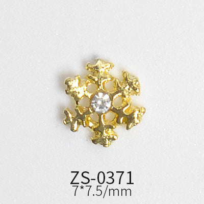 A stunning ornament from Dynamic Nail Supply, this gold snowflake-shaped charm features a clear central gemstone against a white backdrop. With the reference ZS-0371 and dimensions of 7*7.5/mm, it's perfect for creating exquisite nail designs for winter or Christmas using the 24pcs Snowflake Charms collection, adding dazzling charm to any set.