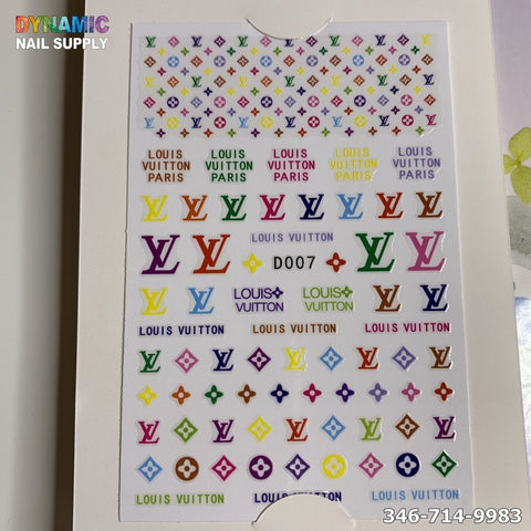 The NAIL ART DESIGN STICKER - D007 by Dynamic Nail Supply features an array of Louis Vuitton logos in vivid red, blue, green, and yellow shades. These are arranged in a grid pattern alongside the phrase "LOUIS VUITTON PARIS," beautifully packaged by Dynamic Nail Supply.