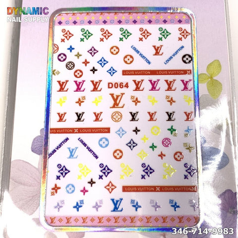 A vibrant sheet of nail art stickers, featuring various Louis Vuitton logos and patterns in red, blue, purple, yellow, and green, showcases the NAIL ART DESIGN STICKER - D064. This exquisite design hails from Dynamic Nail Supply, with the contact number 346-714-9983 elegantly placed in the bottom right corner.