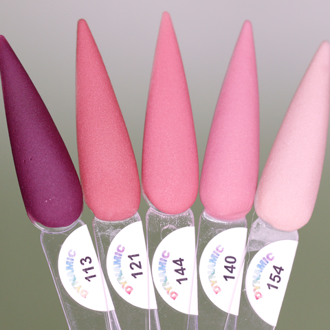 A set of five nail polish swatches is arranged in a fan shape, showcasing Dynamic Nail Supply's 2024 Fall Acrylic Powder Collection (part 1), featuring rich hues from deep purple through varying shades of pink. Each color is labeled with the numbers: 113, 121, 144, 140, and 154. Ideal for pairing with fall acrylic powder for long-lasting nails. The background features a soothing gradient of green and gray.