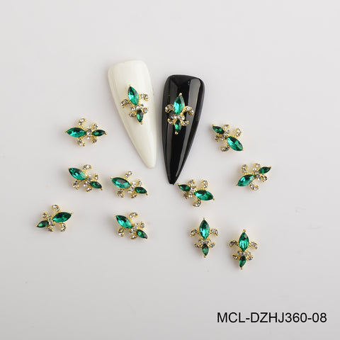 Twenty Saint Fleur De Lis charms in 12 colors from Dynamic Nail Supply, perfect nail art accessories, shown on nail tips.